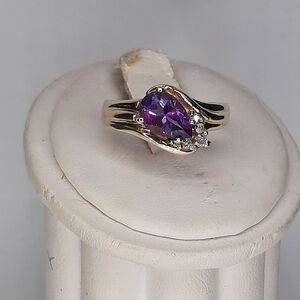 Elegant Yellow Gold Purple Gemstone Ring
